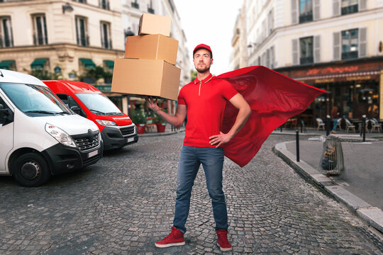 Superhero man with red uniform in front of the shops for delivery and pickup of the goods