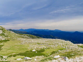 Fototapeta na wymiar Pozzines and impressive view on the way up to Monte Renoso, Corsica, France.