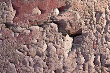 Old wall background with cracked paint, texture of weathered paint. High quality photo
