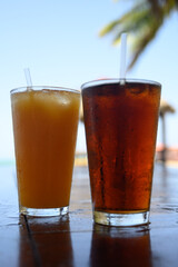 Alcoholic drinks on the beach in hot wheather