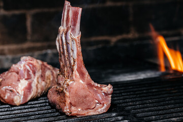 raw fresh rack of lamb on grill background. Fired Barbecue, Restaurant menu, cookbook recipe © Надія Коваль