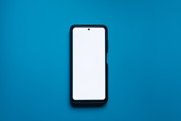 Mobile phone on blue background