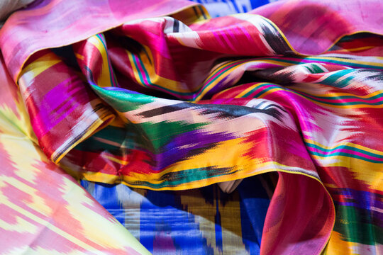 Background of multi-colored silk with national uzbek pattern