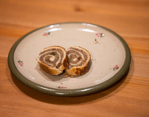 Slices of freshly made Hungarian christmas cake beigli	
