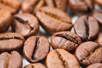 Close-up shot of some roasted coffee beans.