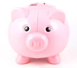 Piggy bank in traditional pink color.