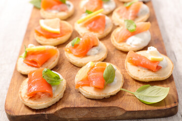 festive canape with cream and smoked salmon