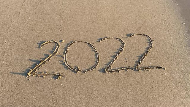 2022 on the beach happy new year on nature background	