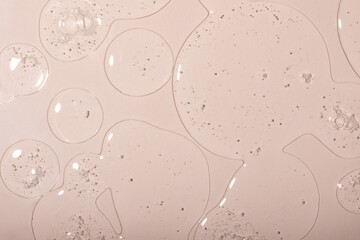 Top view of liquid cosmetics gel with bubbly structure on pastel background.Good as cosmetic mockup.