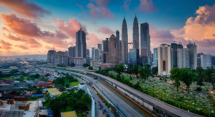 Cityscape of Kuala lumpur city skyline at sunrise in Malaysia.