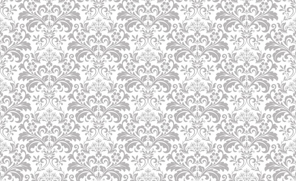 Wallpaper in the style of Baroque. Seamless vector background. White and gray floral ornament. Graphic pattern for fabric, wallpaper, packaging. Ornate Damask flower ornament.