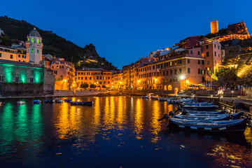 Fototapeta premium Beautiful Italian fishing village by night-Vernazza- Italy(cinque terre- UNESCO World Heritage Site