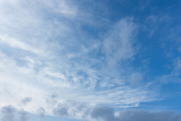 Looking at clouds against a backdrop of azure sky