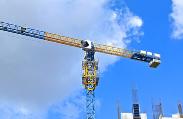 Crane and highrise construction site