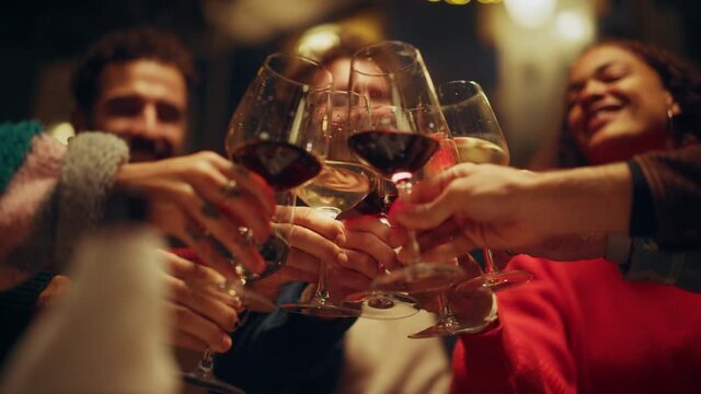 Close Up Footage of People Making Toasts and Touch with Wine and Champagne Glasses at a Garden Party Celebration with Friends on a Warm Summer Evening. Beautiful People Enjoy Life on a Weekend.