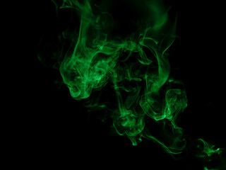 Chaotic mixing smoke creates abstract patterns on a black background