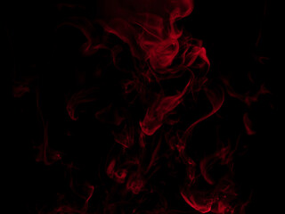 Fototapeta premium Chaotic mixing smoke creates abstract patterns on a black background