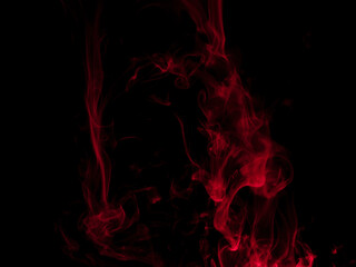 Chaotic mixing smoke creates abstract patterns on a black background