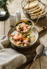 salmon fish soup with mussels and cream
