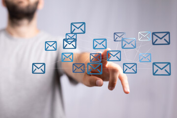 holding smartphone and checking email online on web with
