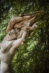 Fotobehang sculpture of a woman among the trees, in the palermo botanical park in buenos aires © Lautaro