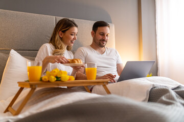 Young couple in the bed