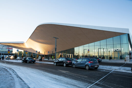 VANTAA, FINLAND - DEC 5, 2021: The new Terminal 2 extension of Helsinki Vantaa Airport, modern Finnish architecture, contemporary Scandinavian building design style at daytime.