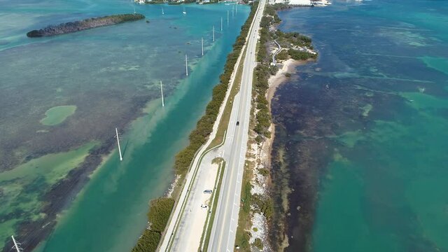 Key West: 7 Mile Bridge, Florida Keys, United States. Aerial view of bridge and Islands near Key West, Florida Keys. Travel highway road. Freeway road. Coastal road.