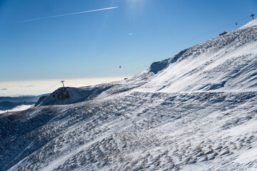 Fototapeta na wymiar ski lift in the mountains, The summer road, Bucegi Mountains, Romania 