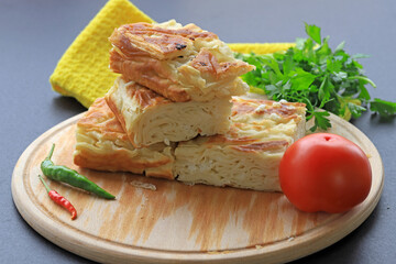 Su Borek - Turkish Borek on wooden surface.