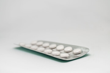 Pack of pills on white background