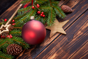Obraz na płótnie Canvas Christmas decoration with ball and fir branches