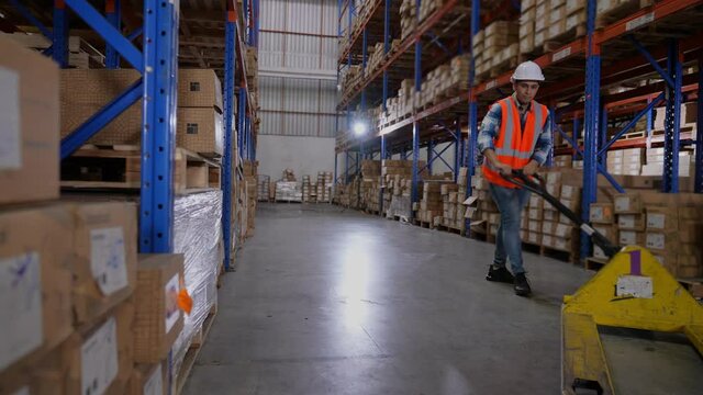 Business concept of 4k Resolution. Employees are moving goods inside the warehouse.