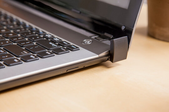 Close up of a power button on a laptop.