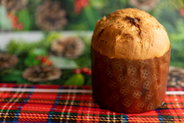delicious panettone on a table decorated for christmas