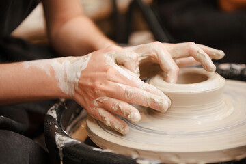 potter  , clay, workshop, human hands making pottery circle