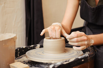 Fototapeta na wymiar human hands making pottery circle , traditional potter , clay,