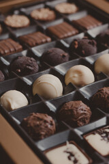 different lined box of chocolate truffles in a box