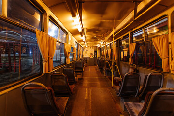 Inside of old empty Russian tram at night