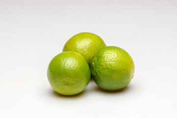 Lemons  with water droplets isolated on white background.