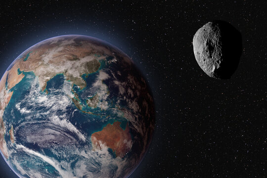 Asteroid approaching planet Earth, elements of this image furnished by NASA