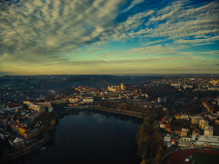 Fototapeta na wymiar aerial view of Tabor czech republic, lake and church tower winter morning sunlight