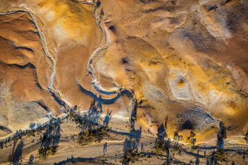 Birds eye view of Australian arid landscape from central South Australia. Aerial images over the Painted Desert, Dry Creek Beds, and scrub bushland