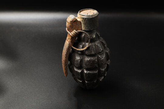 Polish hand grenade on black background