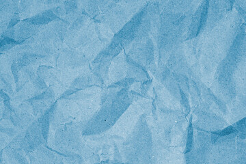 Blue crumpled paper made of recycled stuff. Abstract background