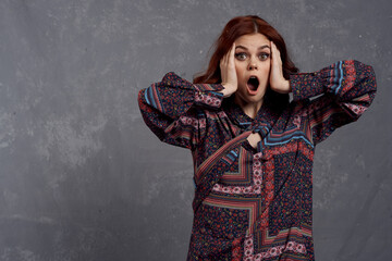 woman in coat fashionable clothes glamor red hair model