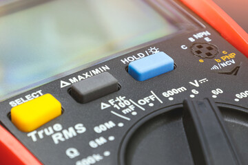 A modern multifunctional multimeter for measuring voltages and short circuits. Close-up