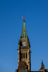 the Canadian flag at half-mast at the Parliament of Canada in Ottawa.