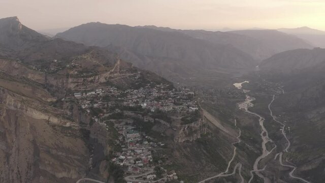 Gunib village in Dagestan. Aerial view of mountainous landscape Dagestan aul Gunib and nearby mountains, famous landmark. Ancient settlement. Travel in Russia. Dlog-M 10 bit