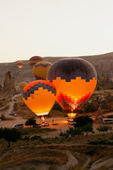 Cappadocia, Turkey - 21 July 2021: Launching balloons, preparing for departure and receiving...